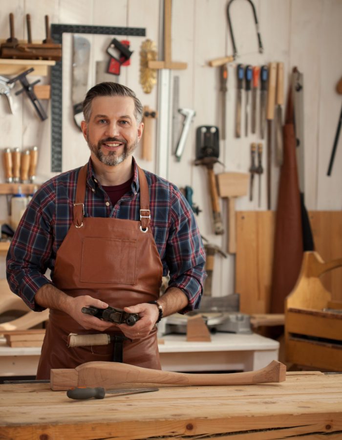 Happy Carpenter/Middle ages handsome carpenter finished creating