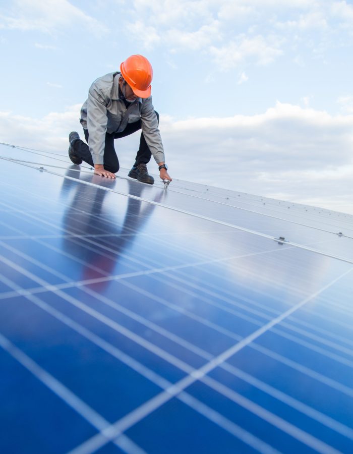 Engineers are checking the electrical system. Selective focus. Engineers and executives are discussing plans.